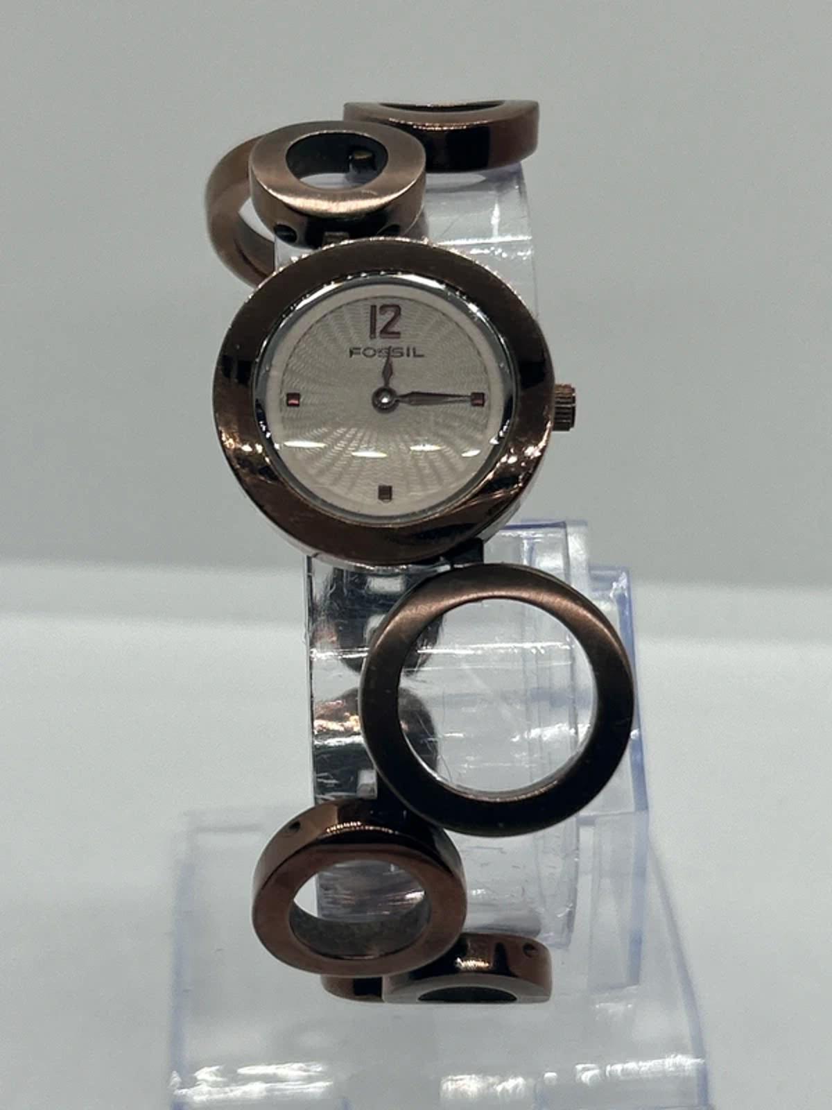 Ladies Fossil bronze bracelet watch waved dial