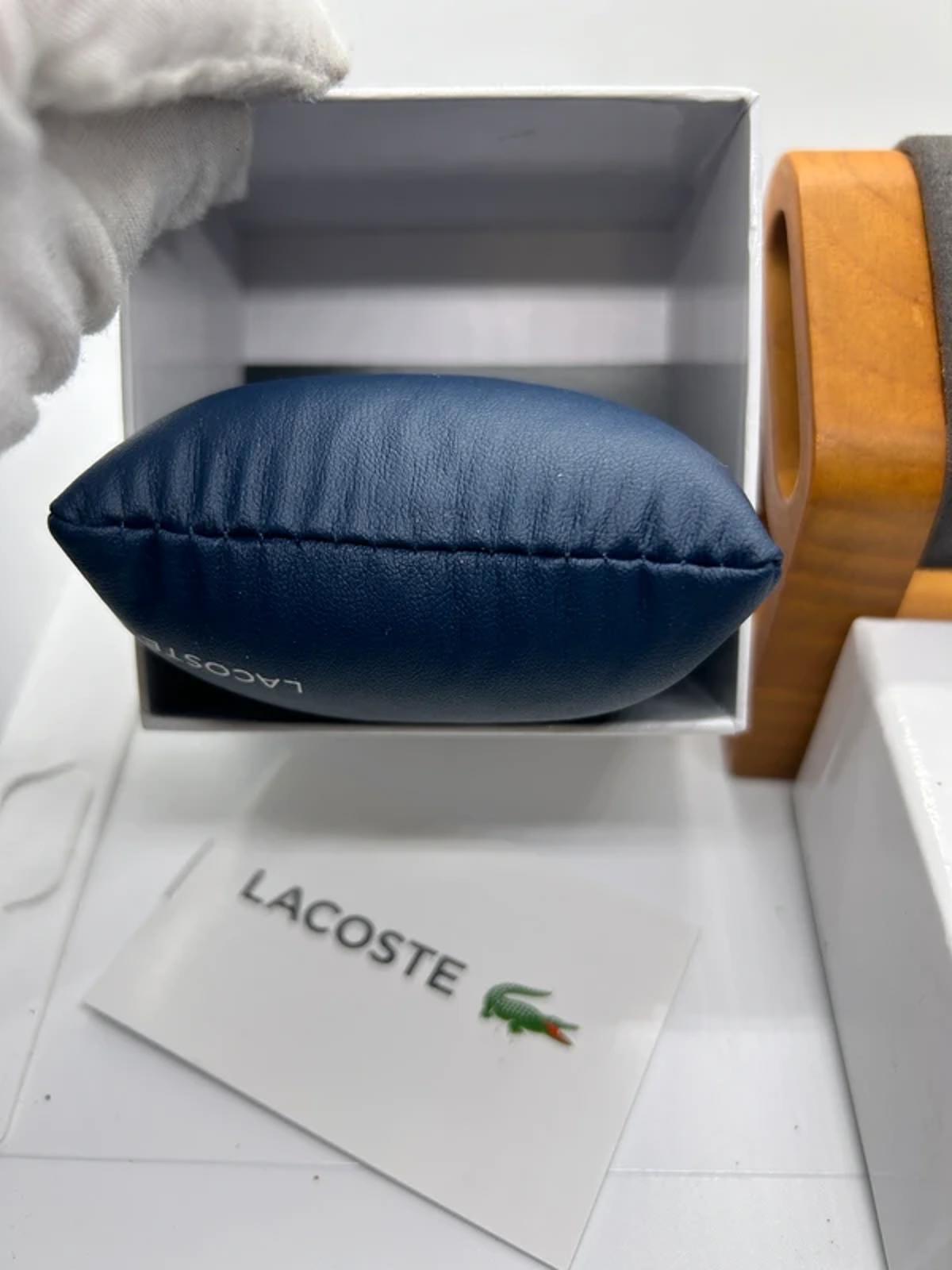 Ladies Lacoste silver and gold watch with box and papers