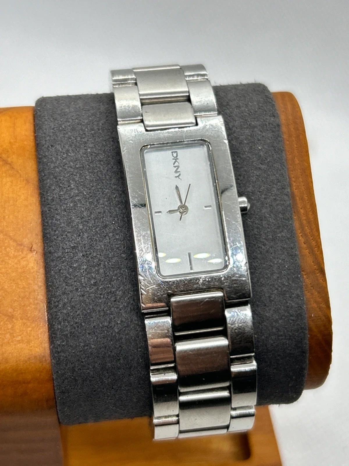 Ladies DKNY slim size silver watch with white dial and silver bracelet