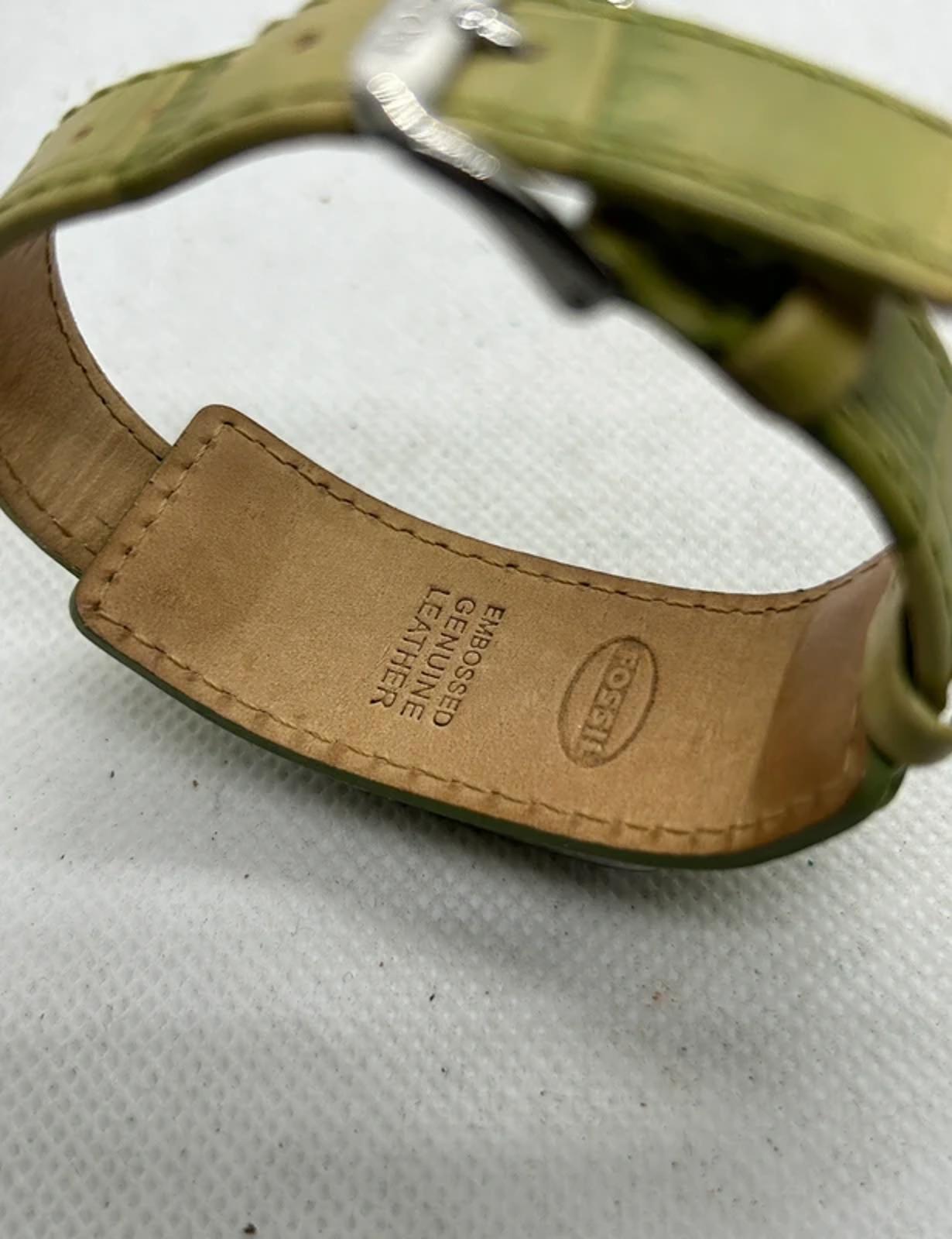 Ladies Fossil silver case watch with olive green strap with watch tin