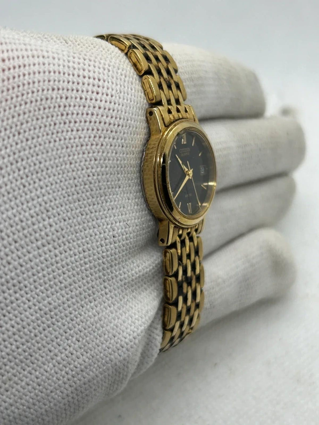 Ladies Citizen gold quartz detach with black dial dress watch