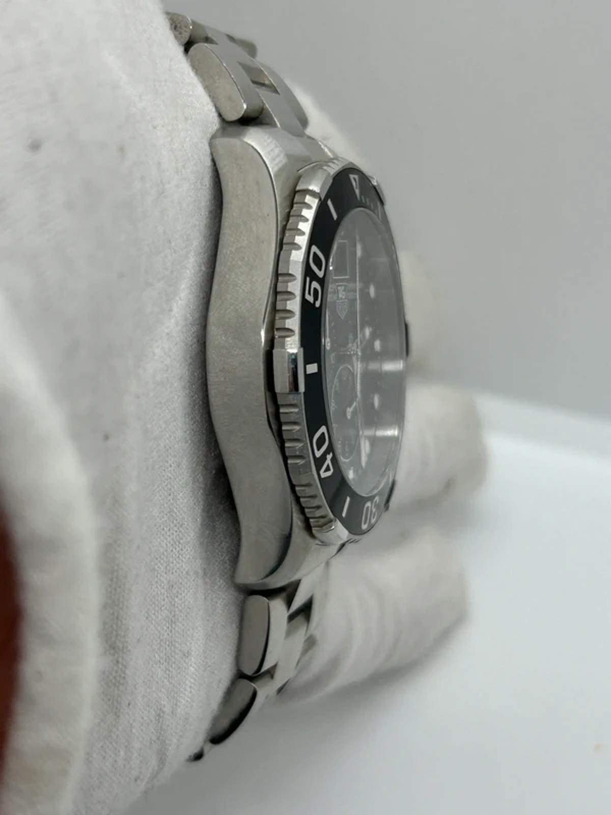 Tag Heuer watch Can1010 aquaracer box and booklet in very good condition