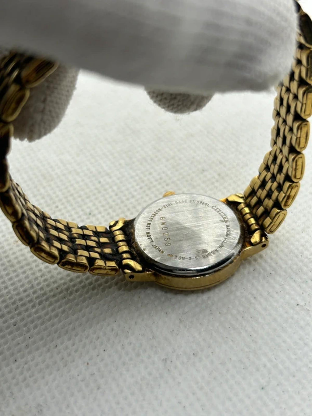 Ladies Citizen gold quartz detach with black dial dress watch