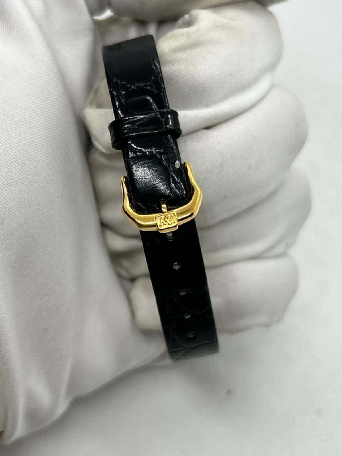 Raymond Weil 18k electro gold plated watch with white dial and black strap