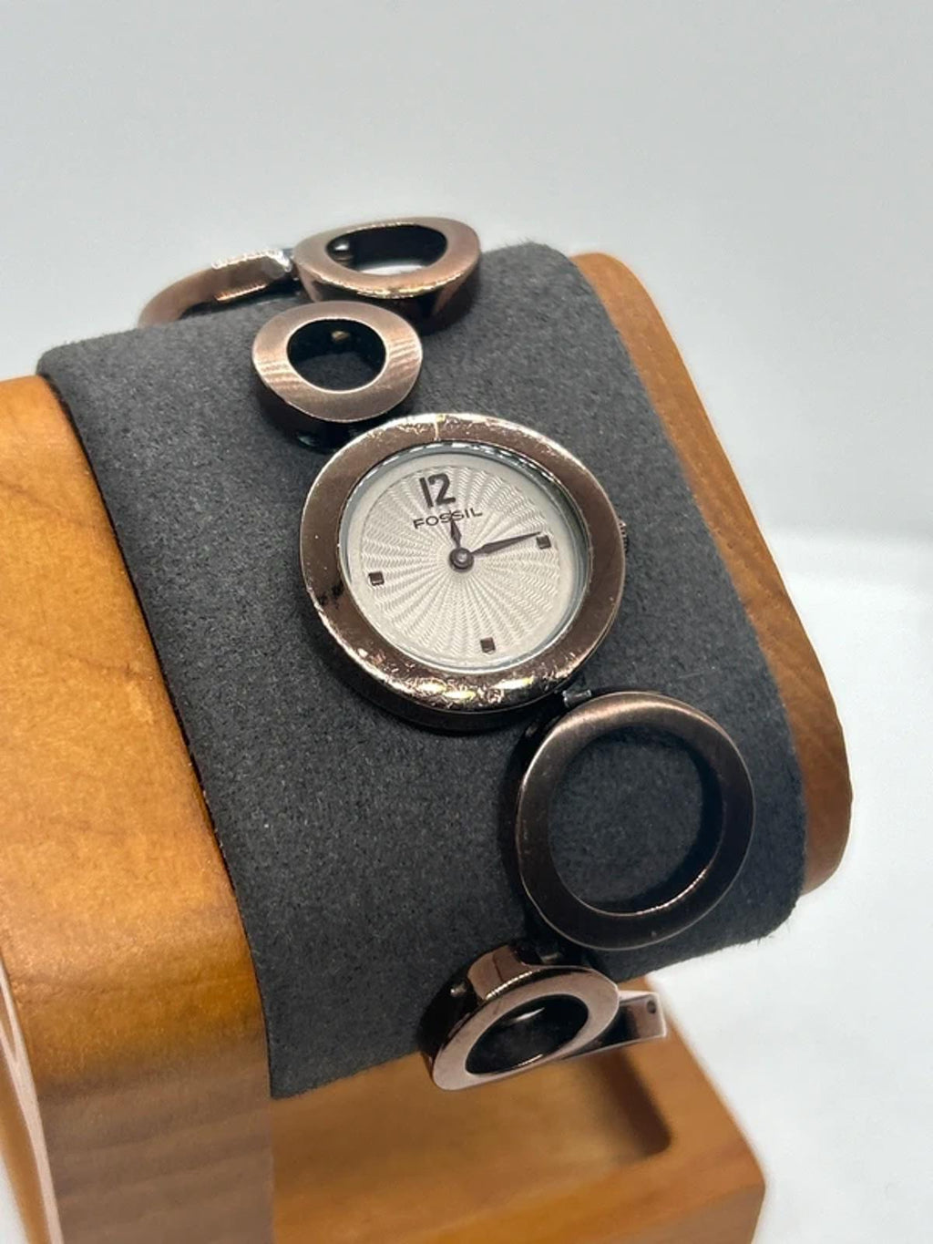 Ladies Fossil bronze bracelet watch waved dial