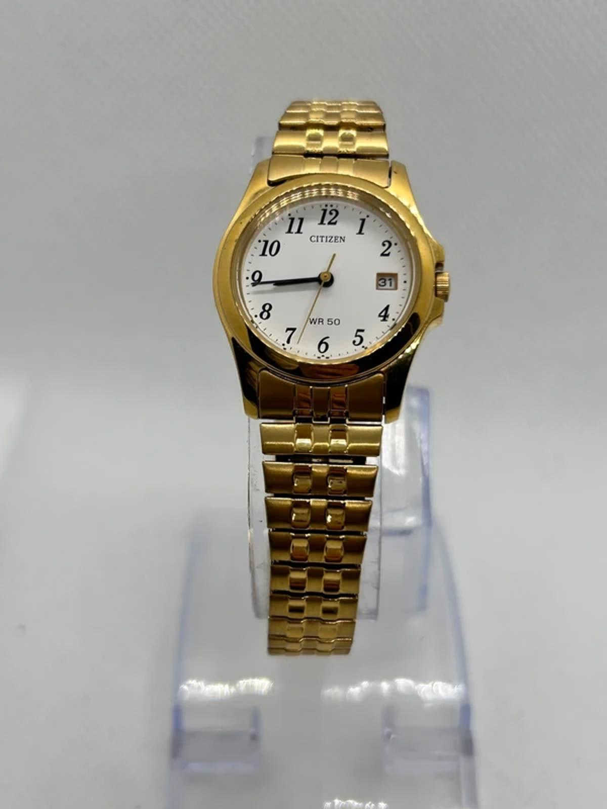 Ladies gold Citizen Watch stretch gold bracelet with white dial
