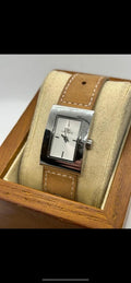Ladies Lacoste silver case white dial watch with tan suede strap