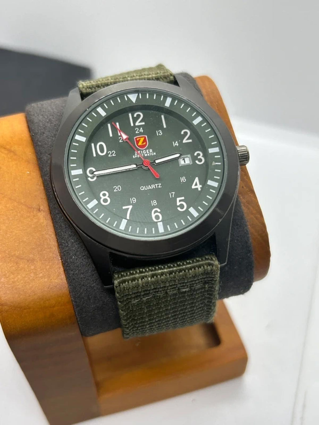 Zeiger sports watch with black case green dial and green fabric strap