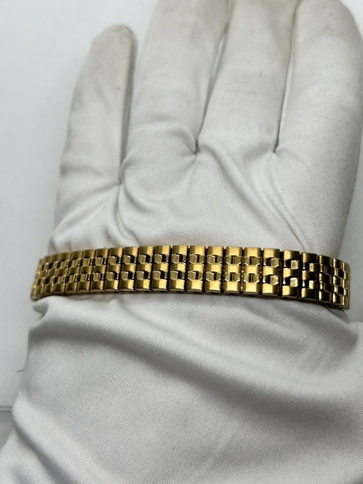 Ladies gold Citizen Watch stretch gold bracelet with white dial