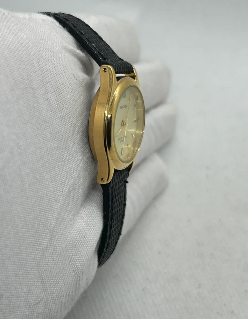 Ladies gold Sekonda case and dial with black strap with box