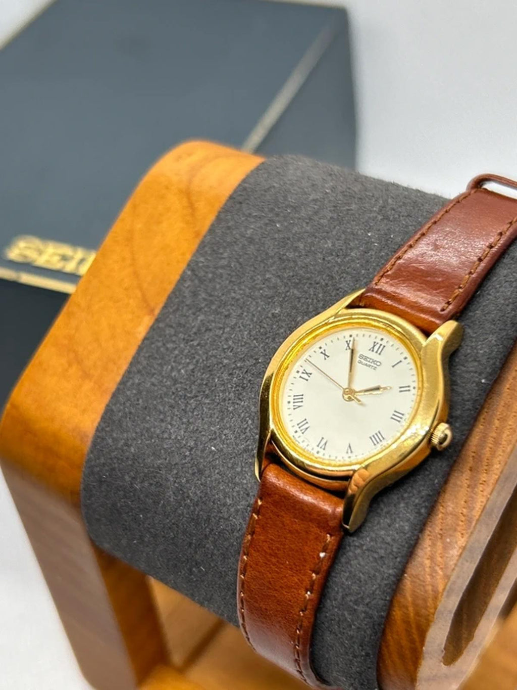 Ladies gold Seiko dress watch with brown leather strap and box