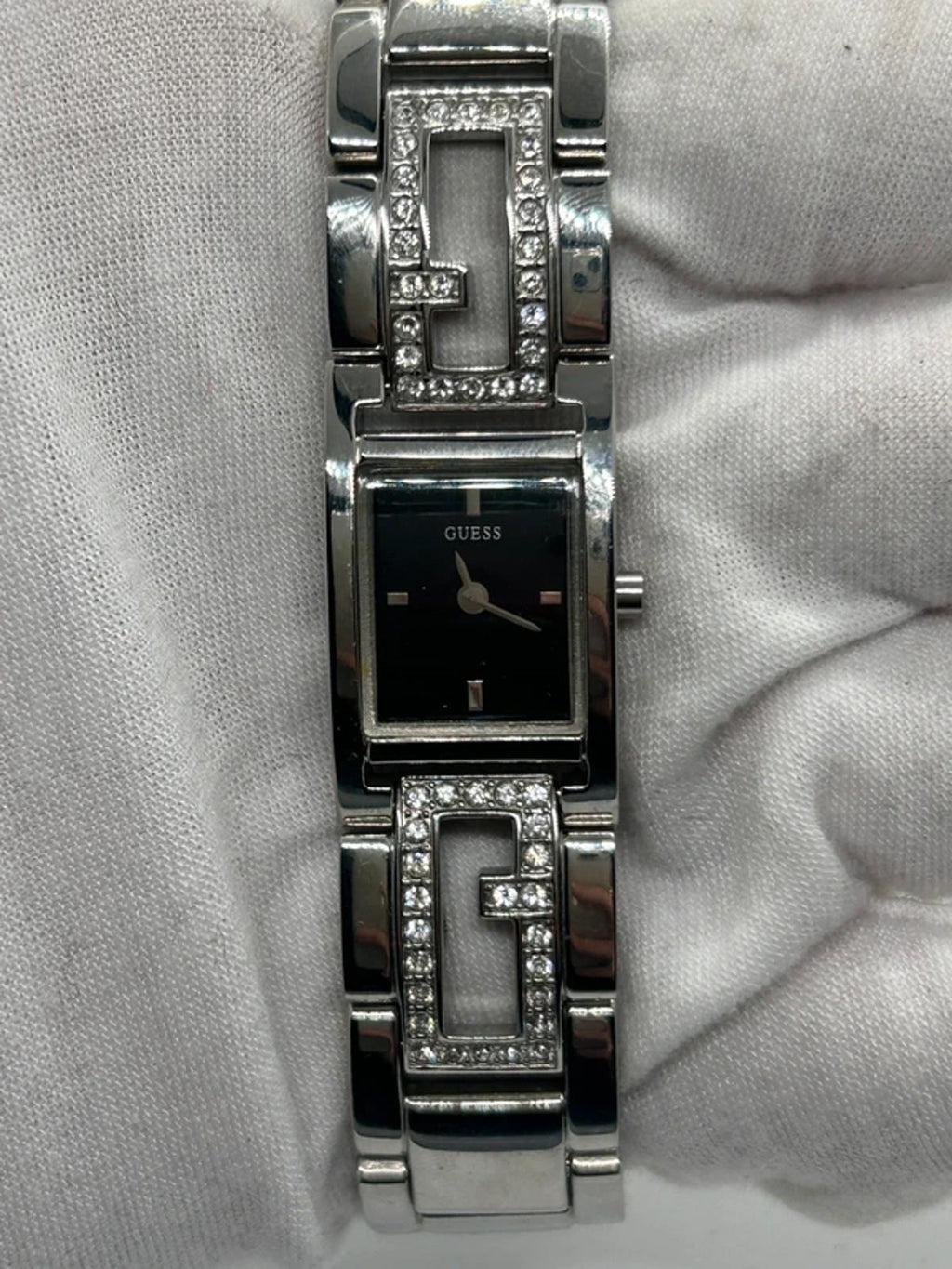 Guess ladies silver tank watch black dial with box and papers