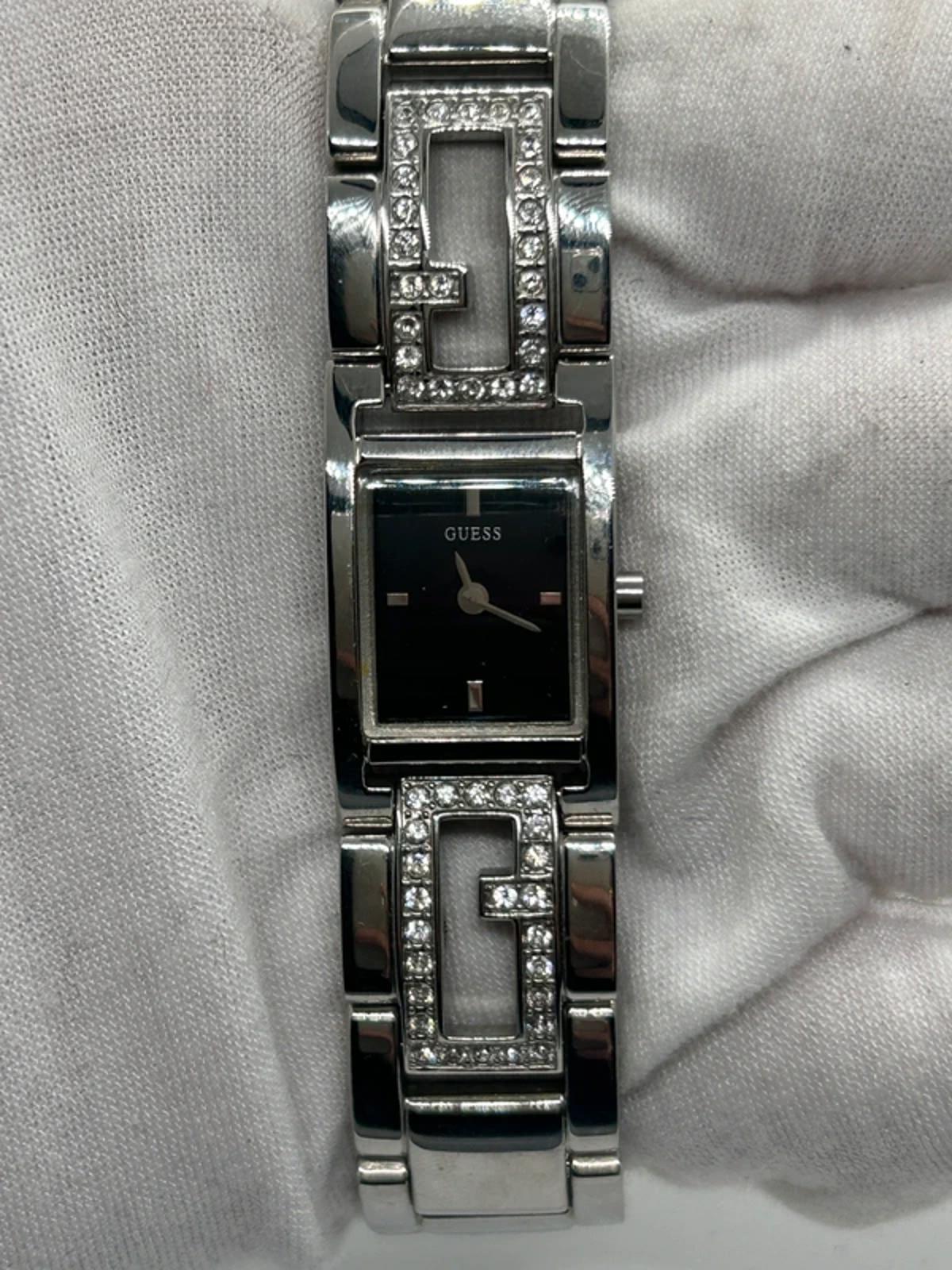 Guess ladies silver tank watch black dial with box and papers