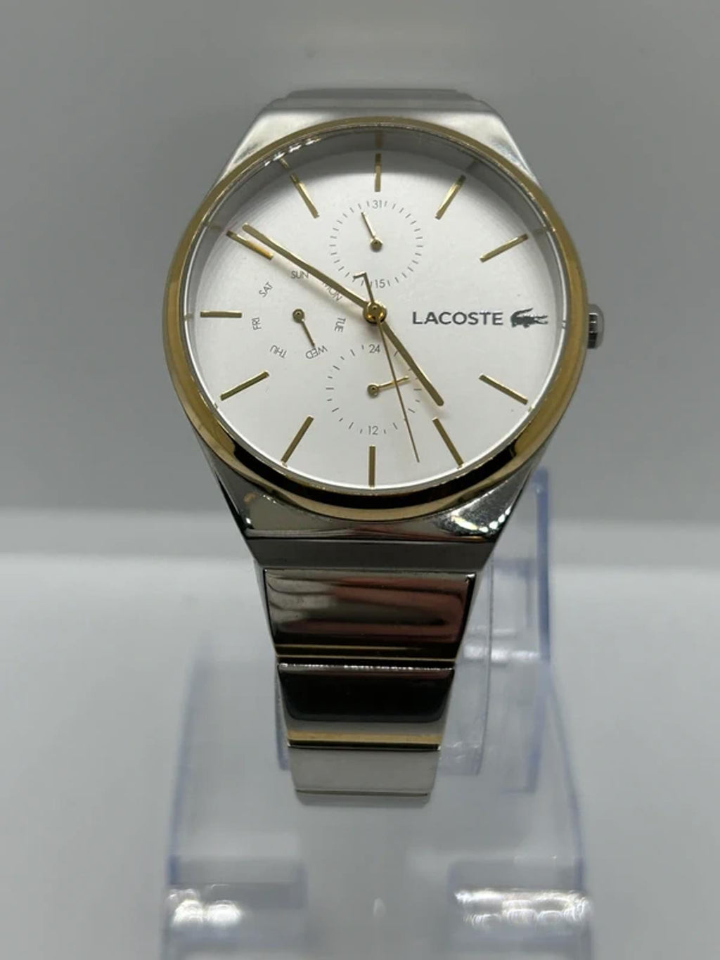 Ladies Lacoste silver and gold watch with box and papers