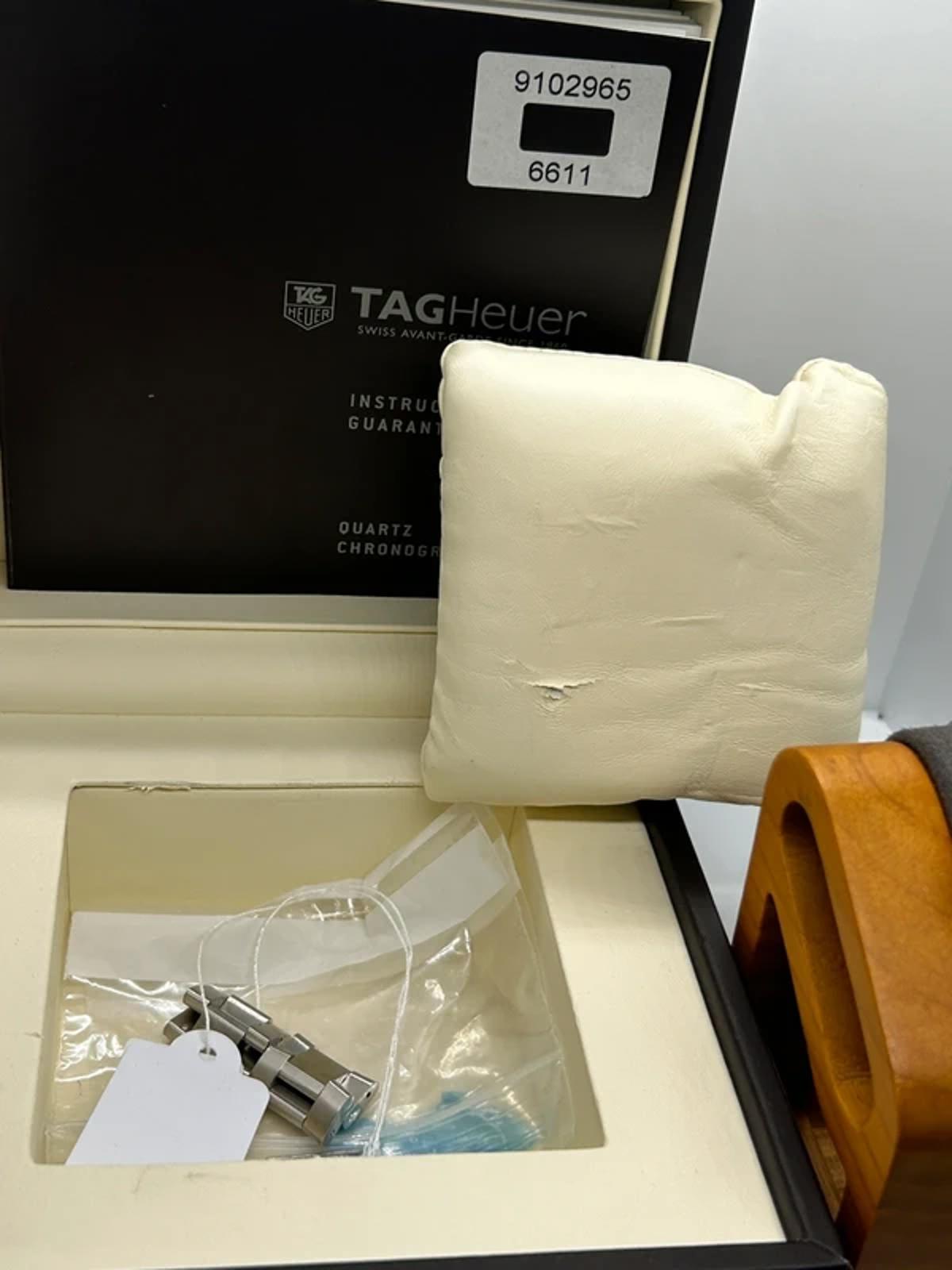 Tag Heuer watch Can1010 aquaracer box and booklet in very good condition