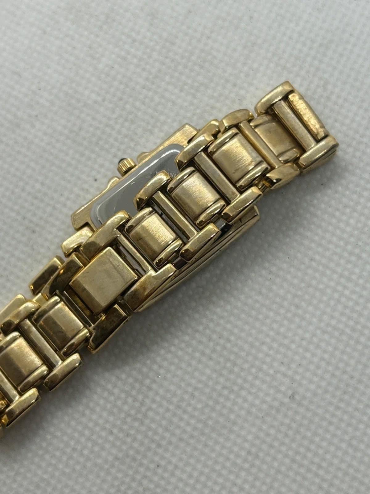 Vialli champagne gold tank watch with patina box and papers