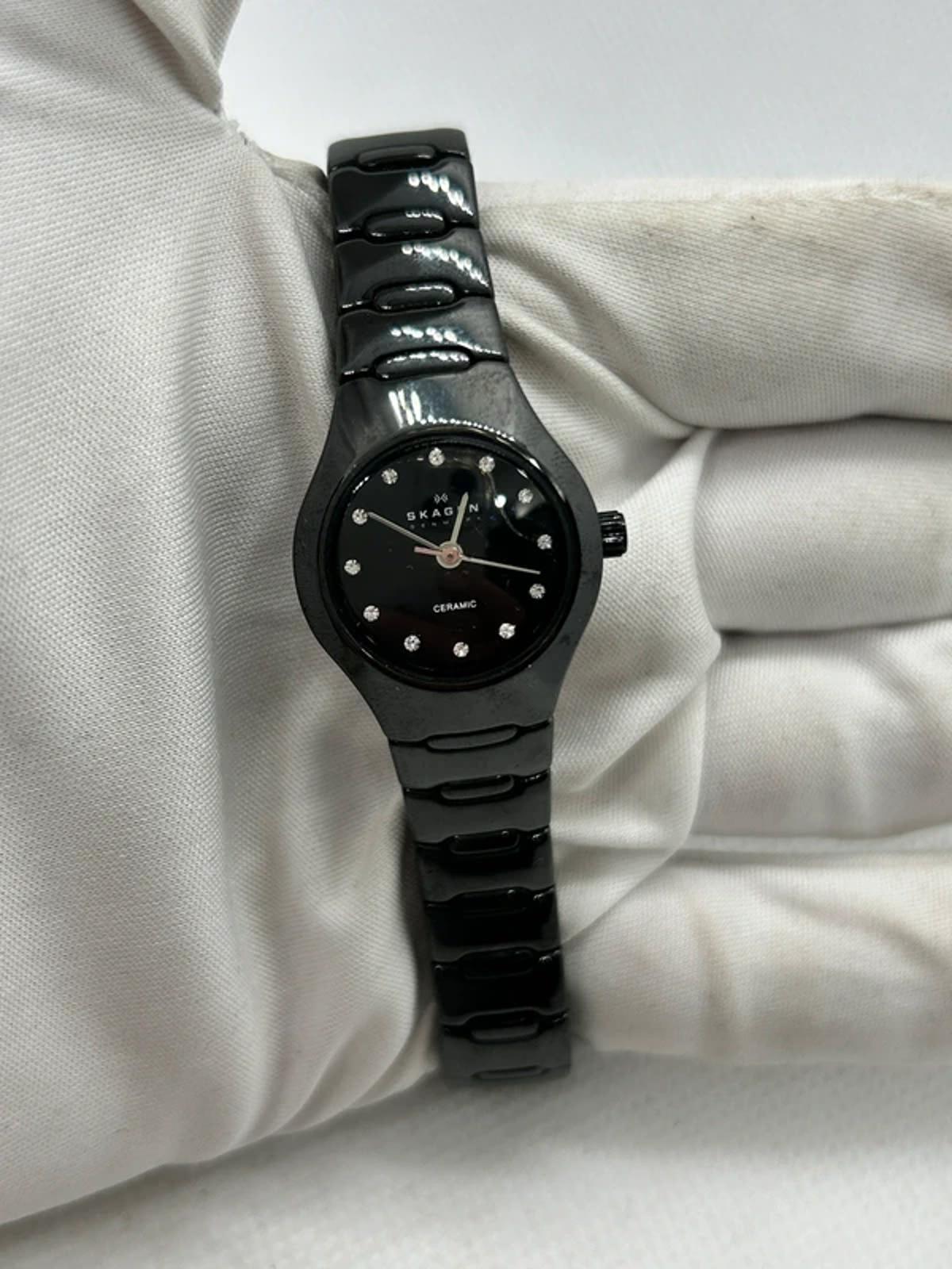 Ladies black Skagen watch with black dial and black bracelet
