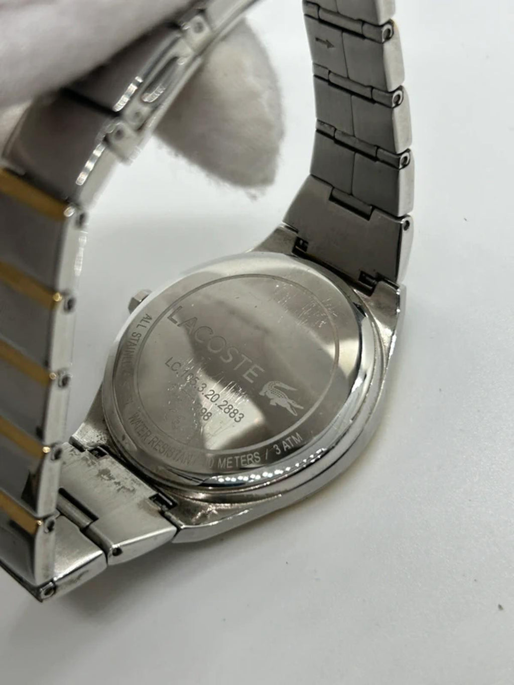 Ladies Lacoste silver and gold watch with box and papers