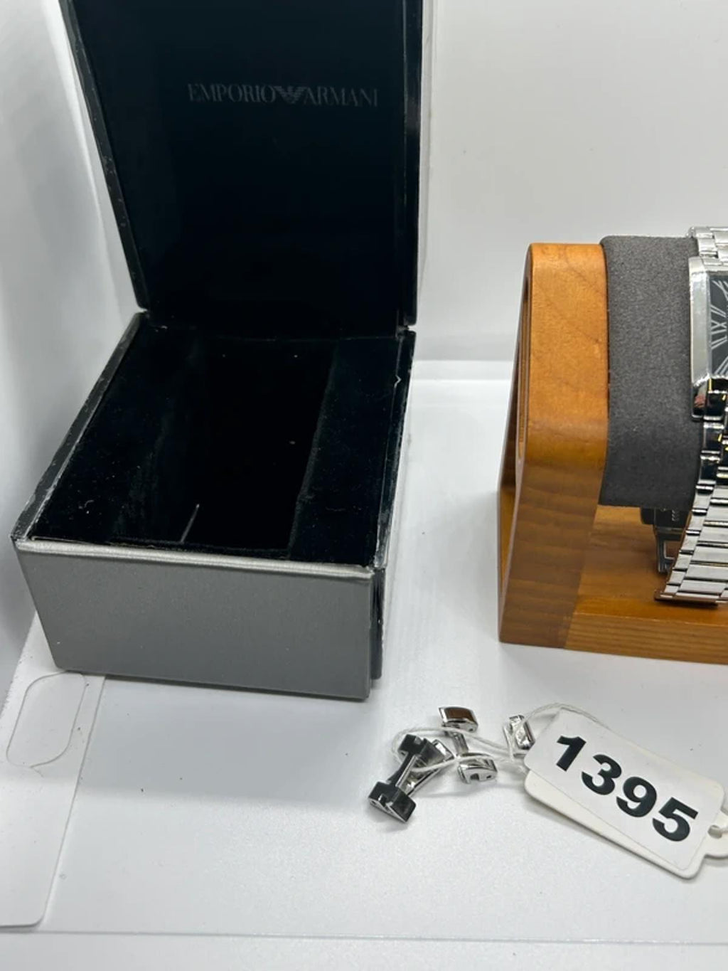 Unisex sized Emporio Armani  silver and black watch box and spare links