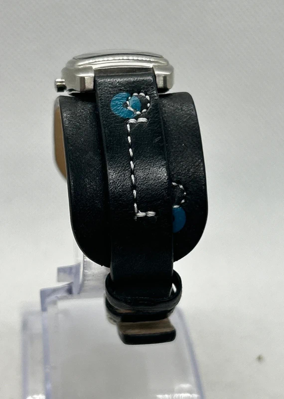 fossil ladies quartz watch on black leather band blue dial silver case