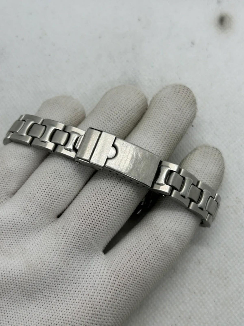 Ladies silver Guess watch diamanté bezel with silver dial and silver bracelet