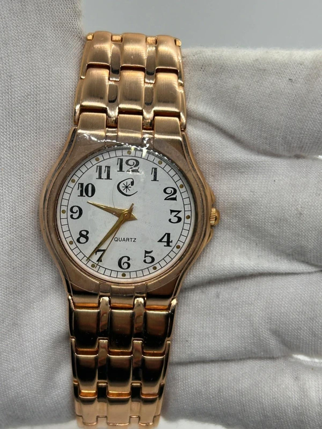 Ladies Copperfield gold case watch and bracket with white dial