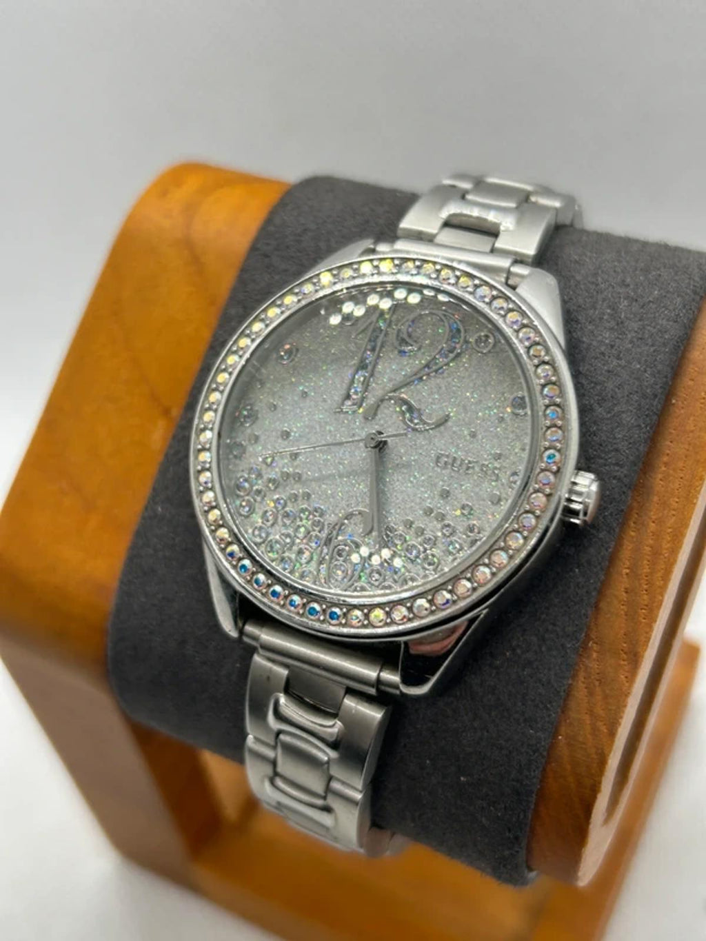 Ladies silver Guess watch diamanté bezel with silver dial and silver bracelet