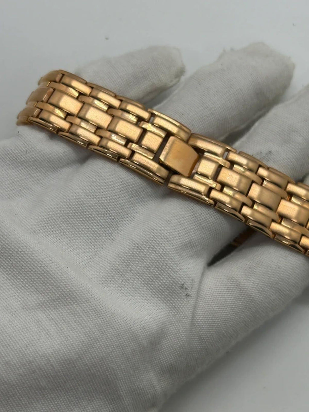 Ladies Copperfield gold case watch and bracket with white dial
