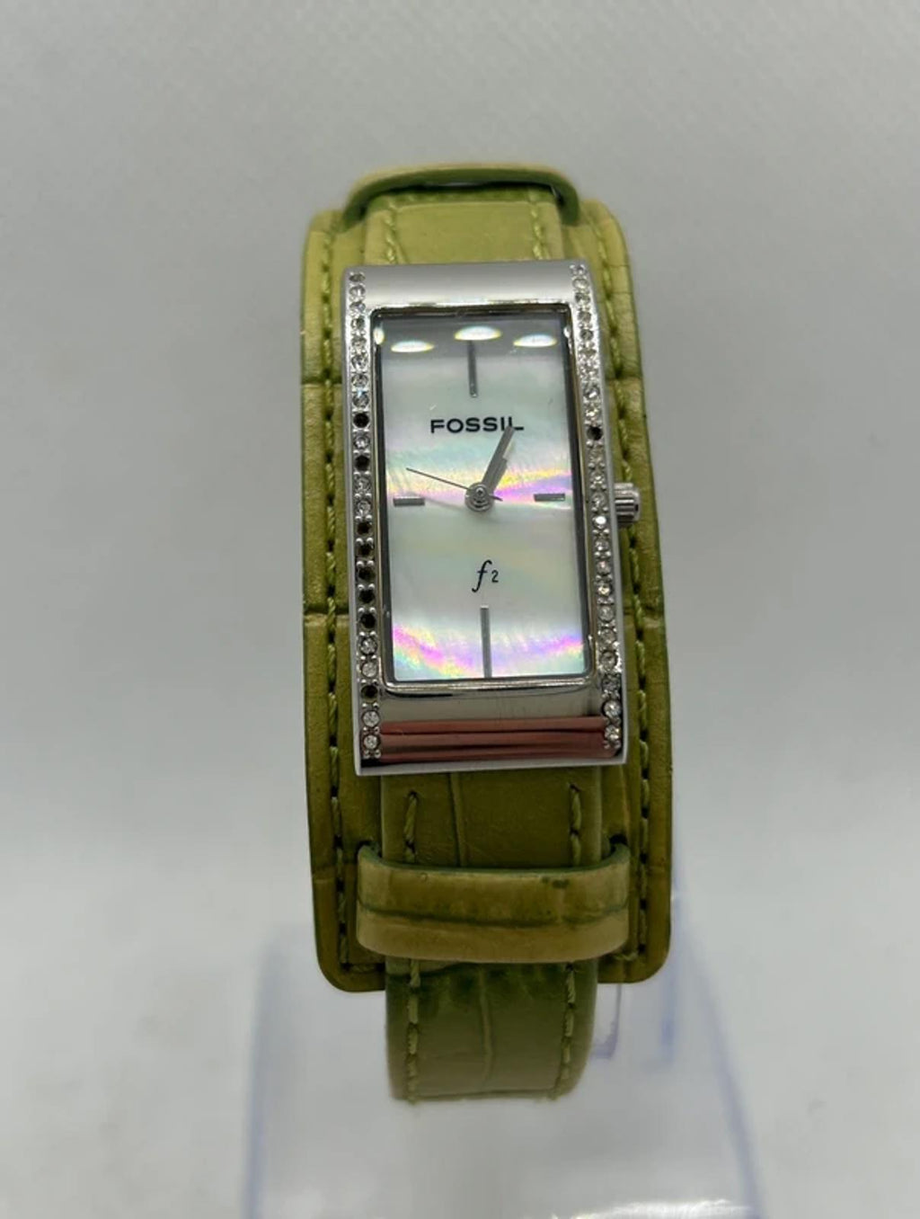 Ladies Fossil silver case watch with olive green strap with watch tin