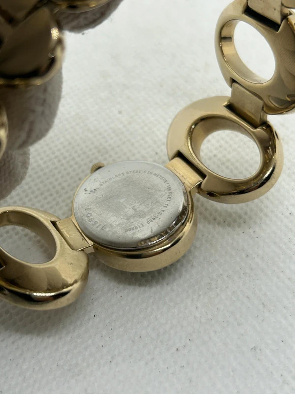 Ladies Fossil gold oval bracelet style watch