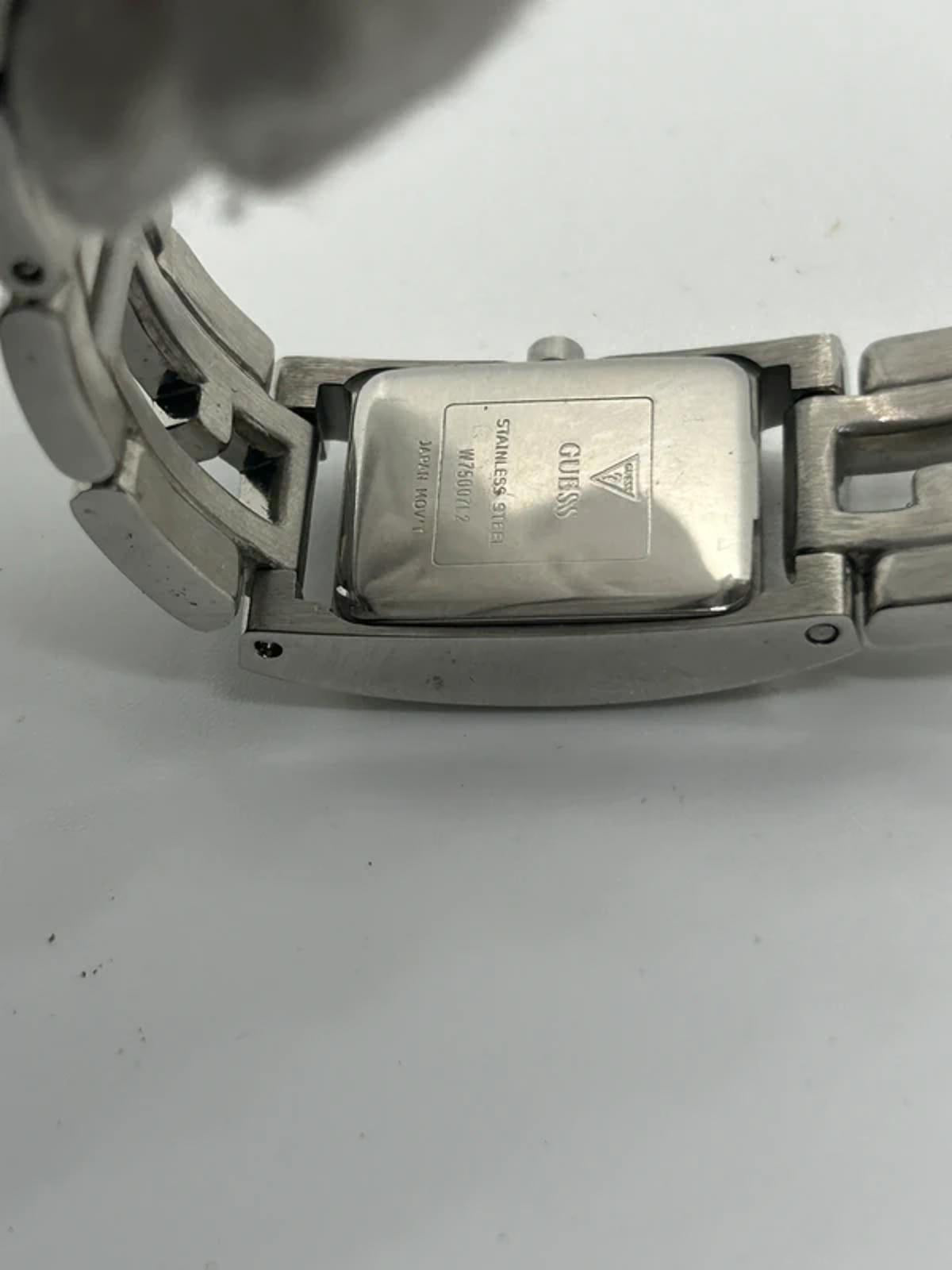 Guess ladies silver tank watch black dial with box and papers