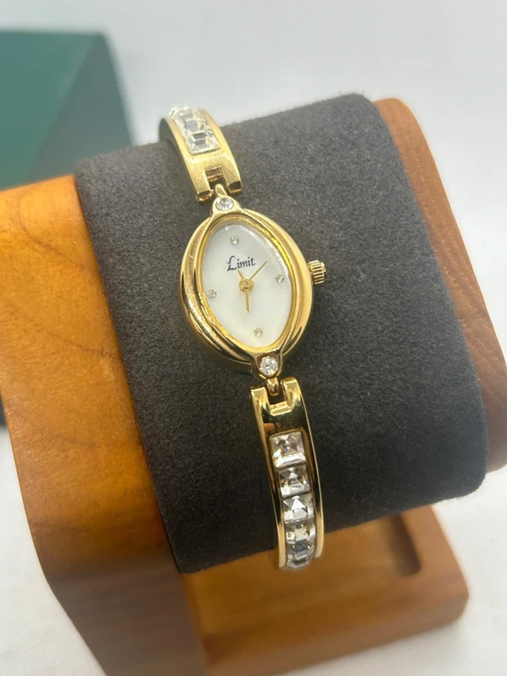 Ladies limit gold cocktail dress watch silver dial with box and papers