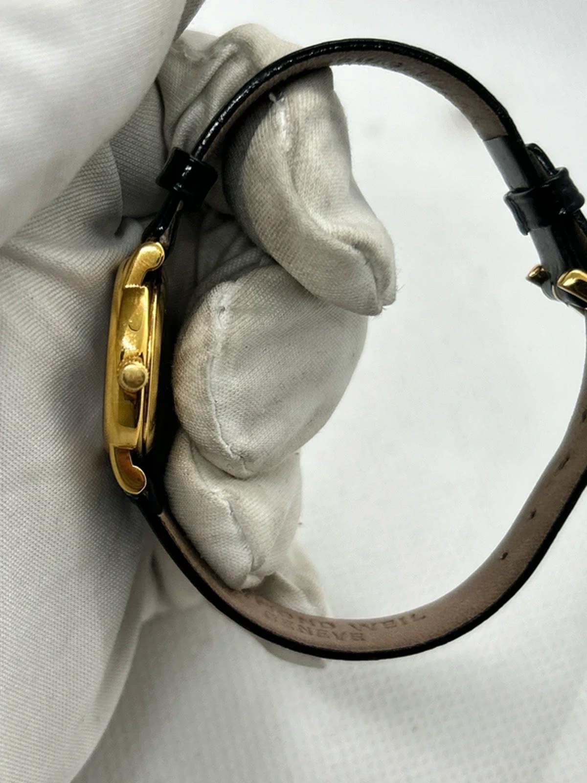 Raymond Weil 18k electro gold plated watch with white dial and black strap