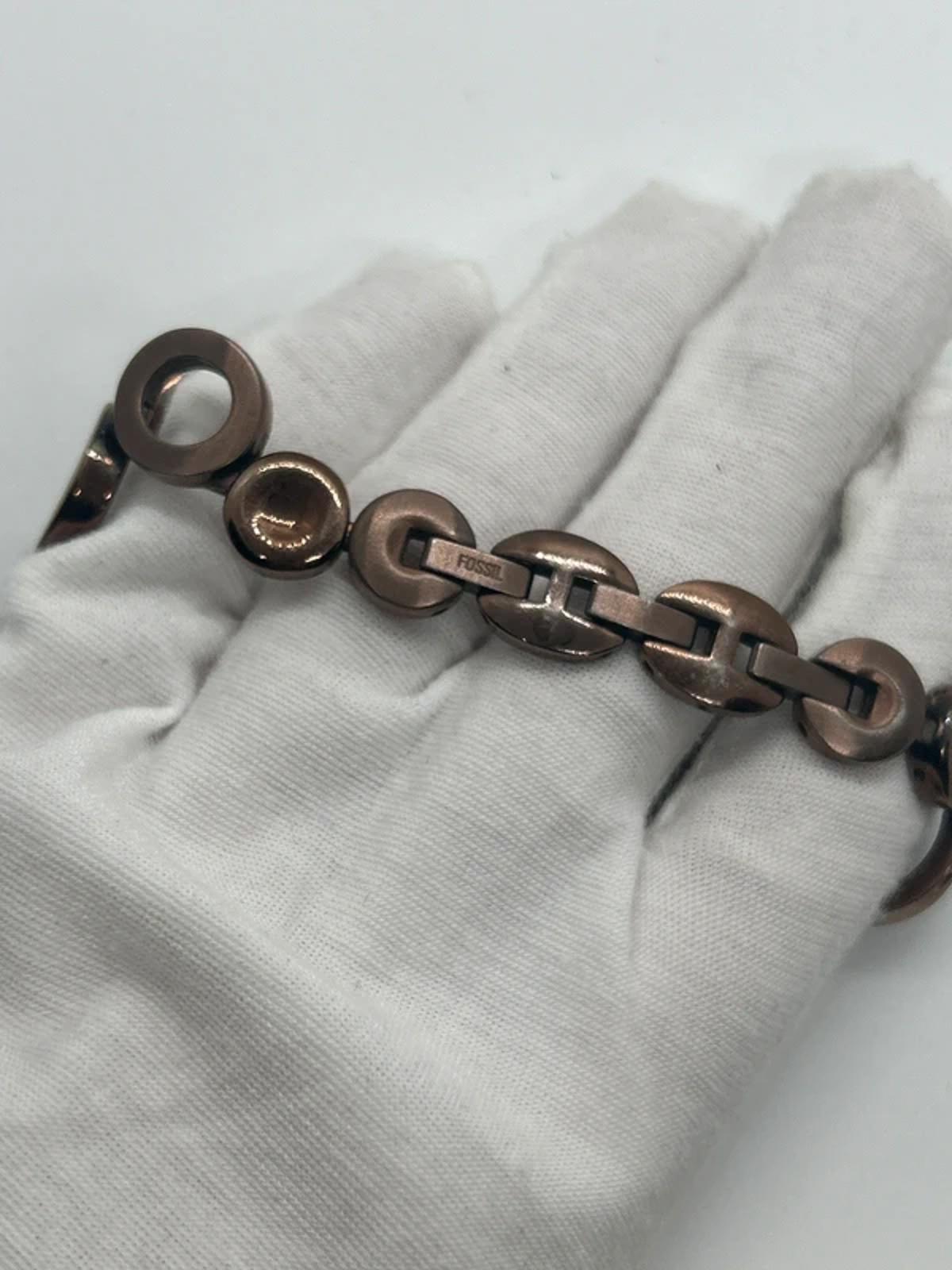Ladies Fossil bronze bracelet watch waved dial