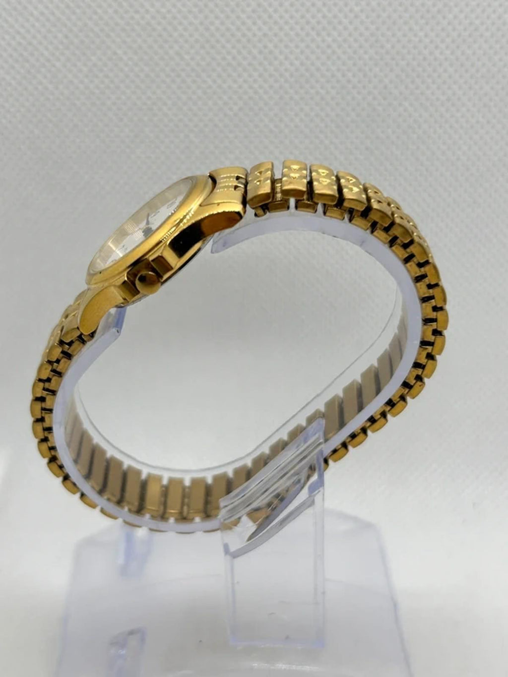 Ladies gold Citizen Watch stretch gold bracelet with white dial