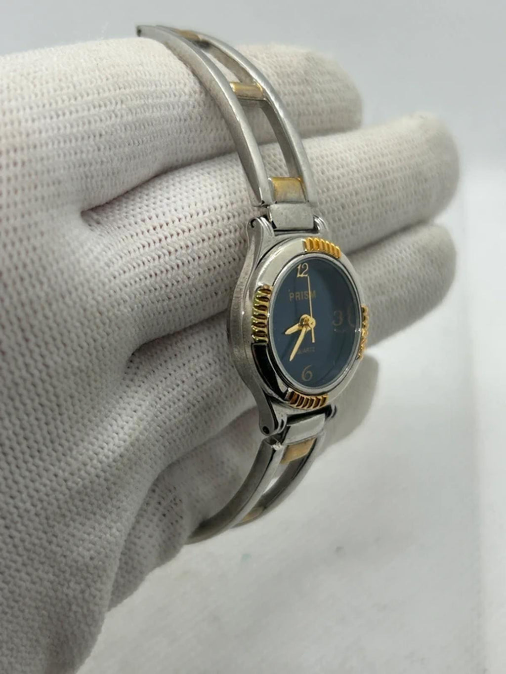 Ladies gold and silver Prism watch changeable bezel watch with box