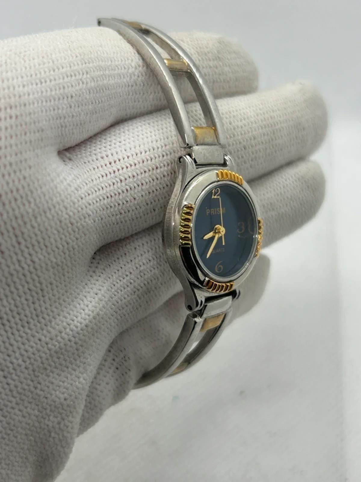 Ladies gold and silver Prism watch changeable bezel watch with box