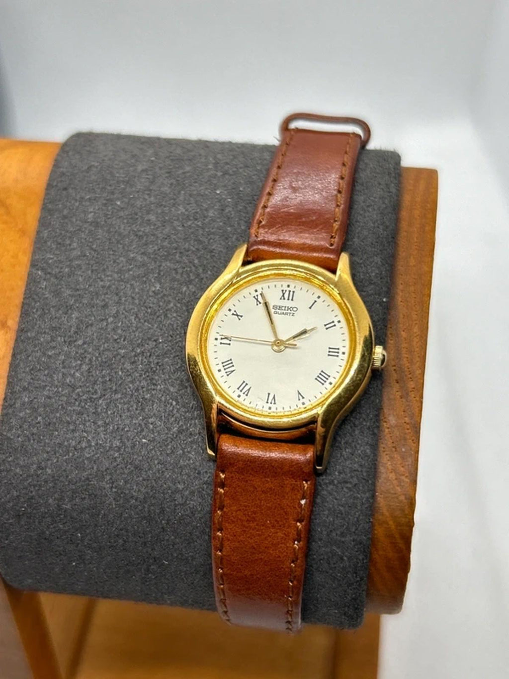 Ladies gold Seiko dress watch with brown leather strap and box