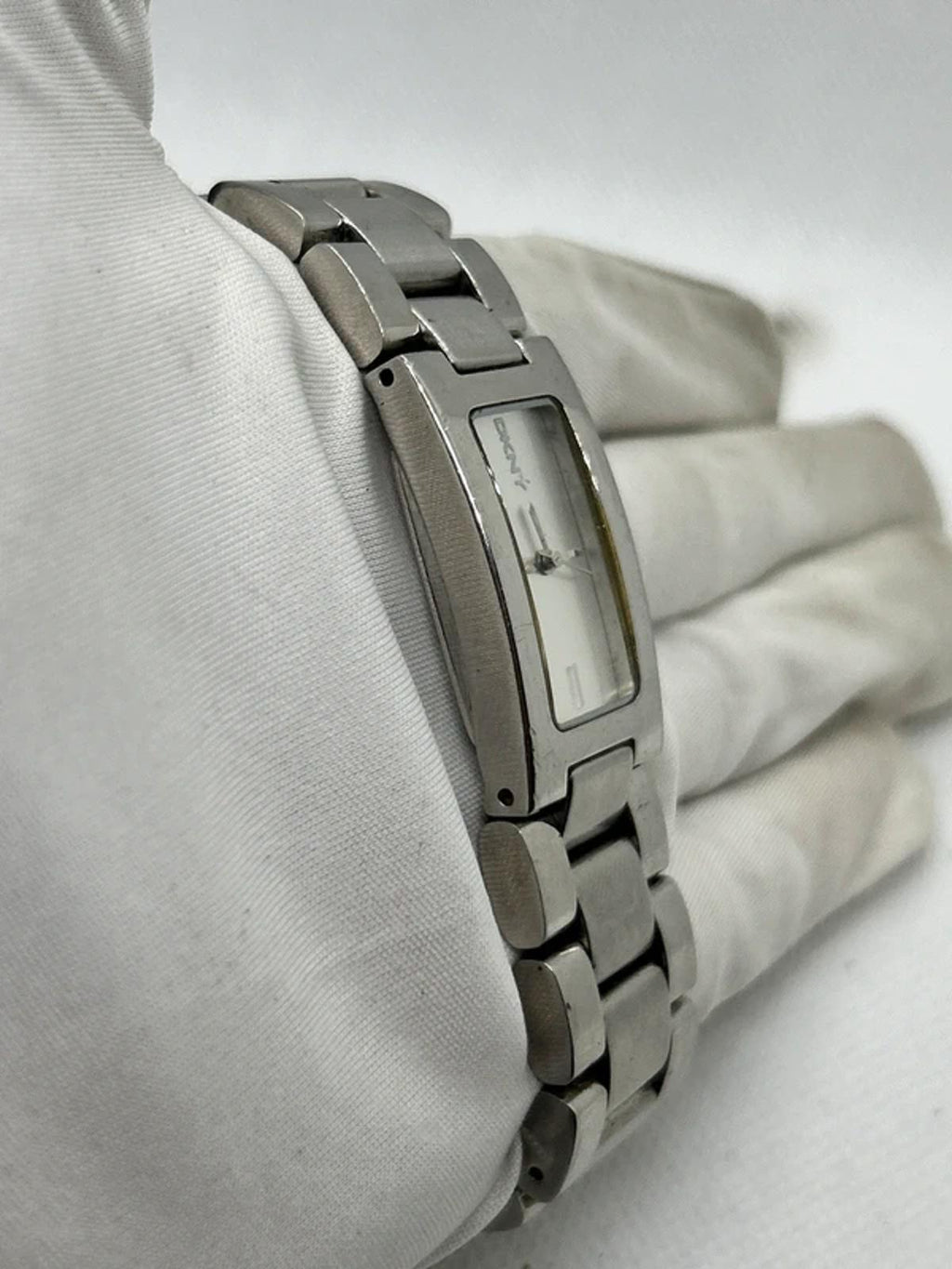 Ladies DKNY slim size silver watch with white dial and silver bracelet