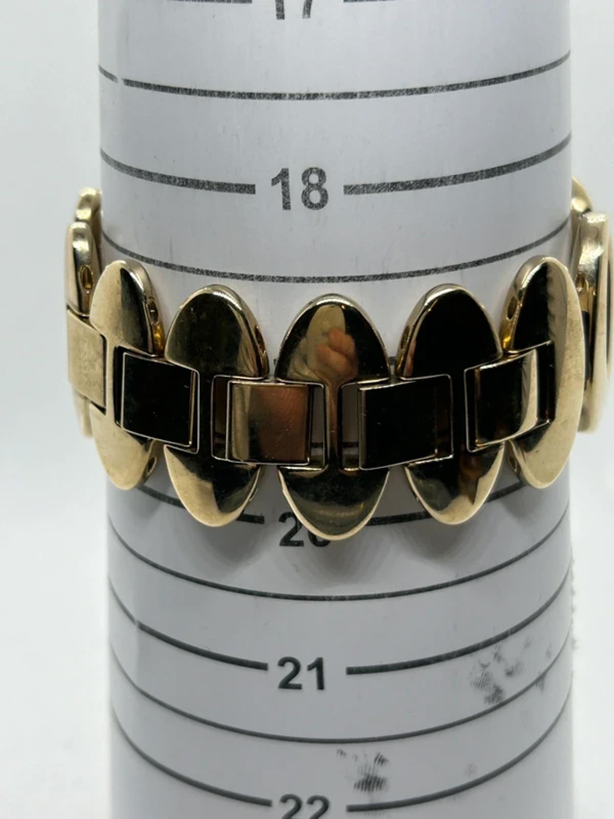 Ladies Fossil gold oval bracelet style watch