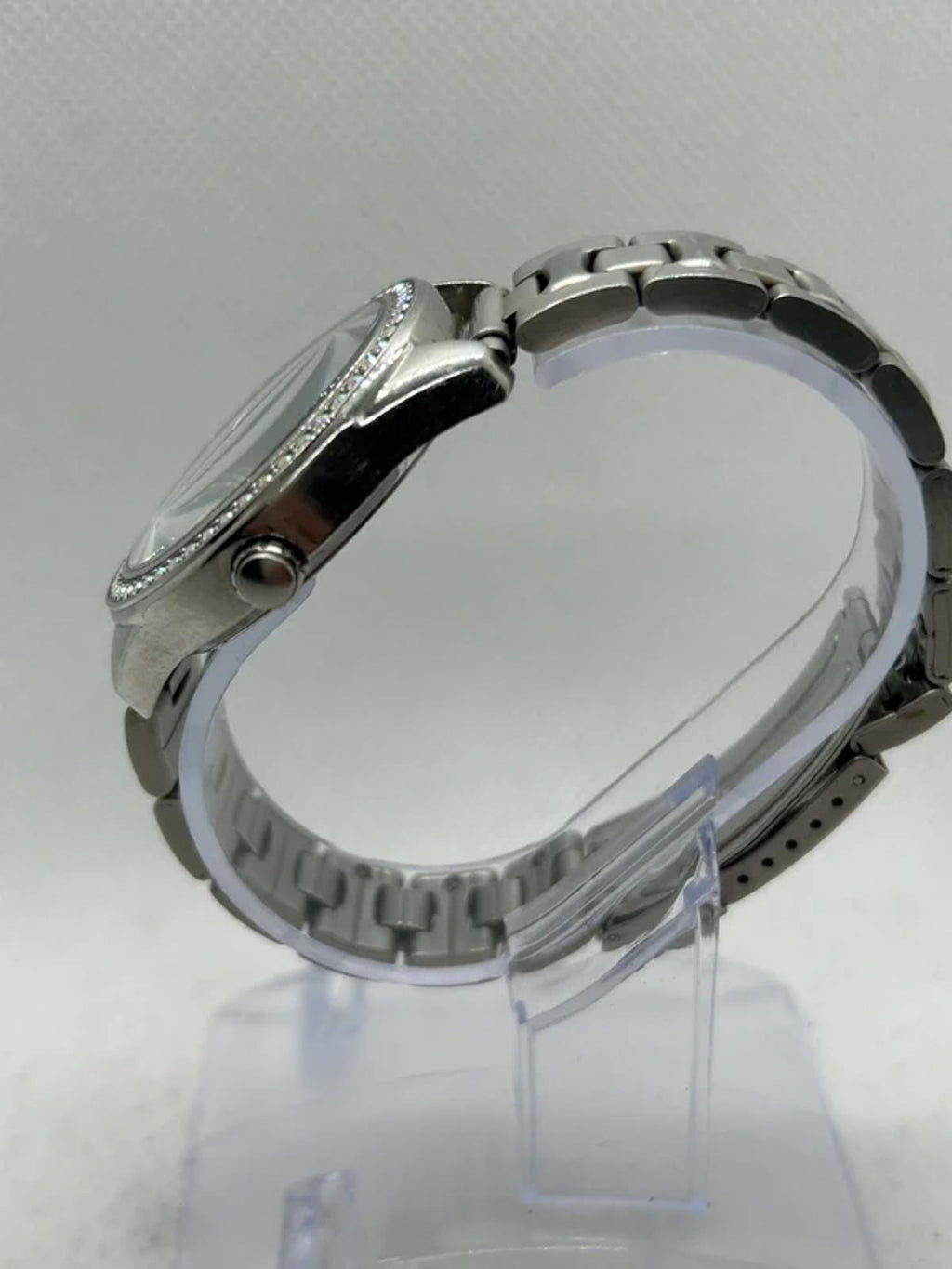 Ladies silver Guess watch diamanté bezel with silver dial and silver bracelet