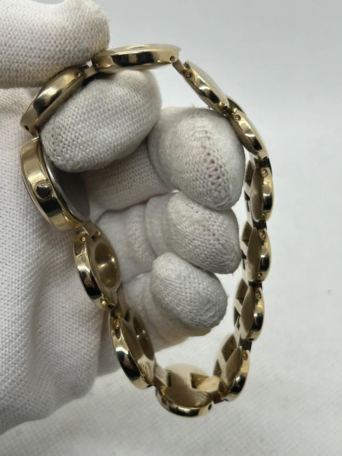 Ladies Fossil gold oval bracelet style watch