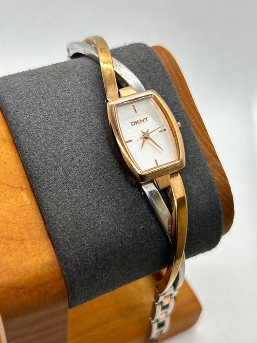 DKNY rose gold and silver bangle style watch