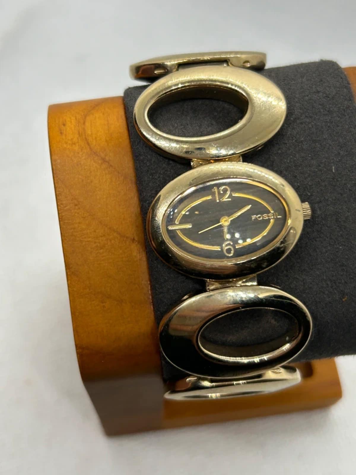 Ladies Fossil gold oval bracelet style watch