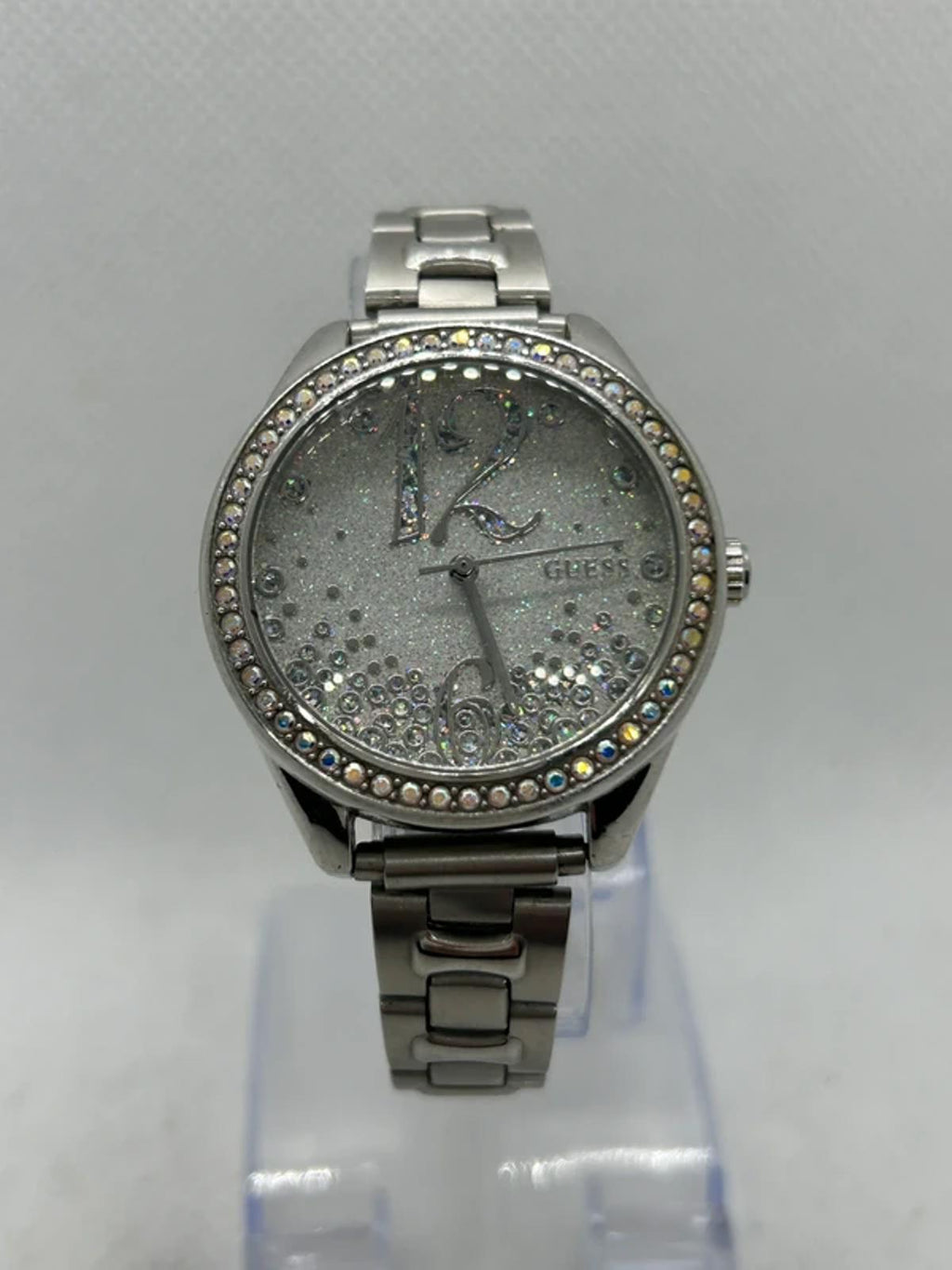 Ladies silver Guess watch diamanté bezel with silver dial and silver bracelet