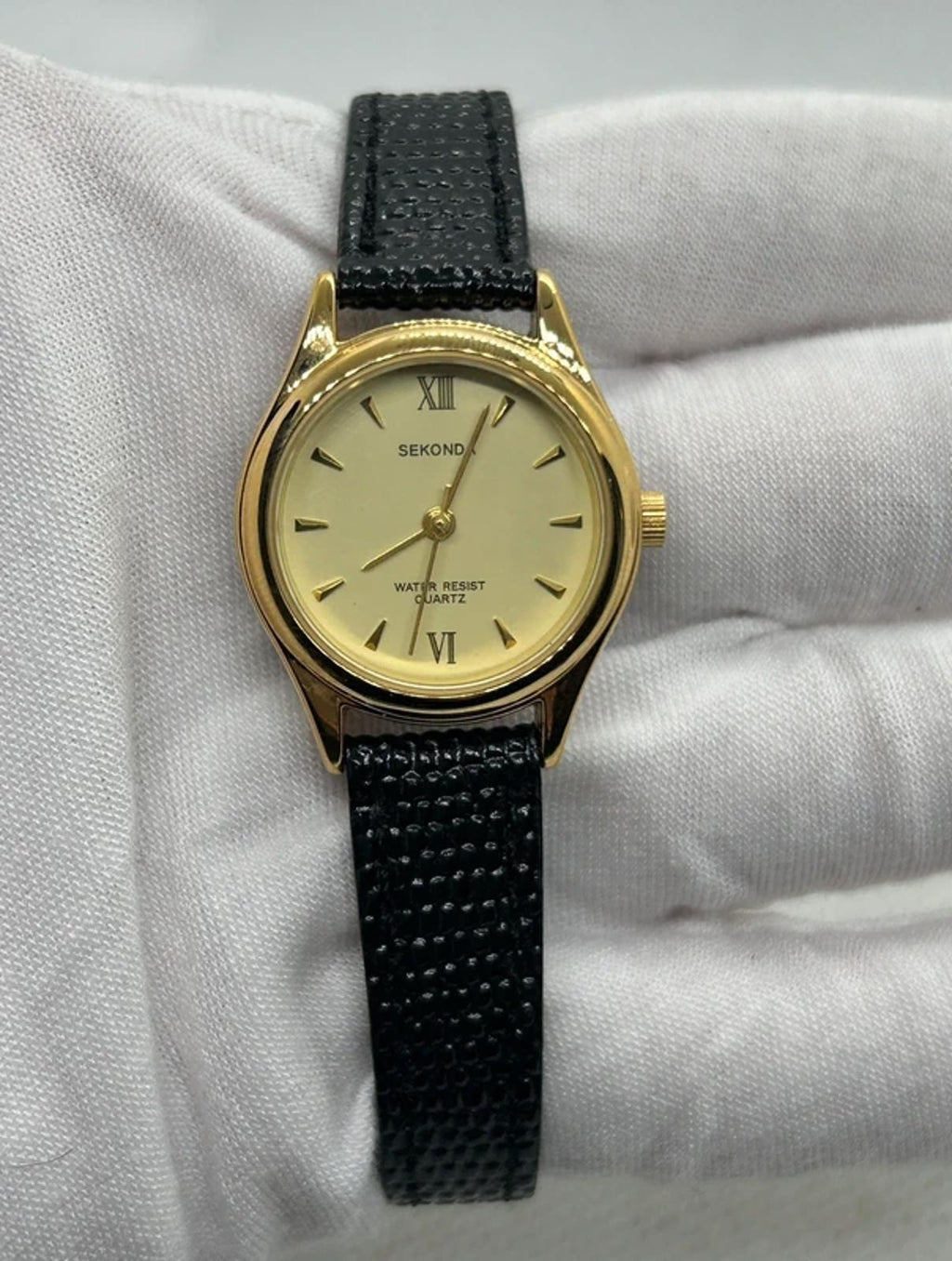 Ladies gold Sekonda case and dial with black strap with box