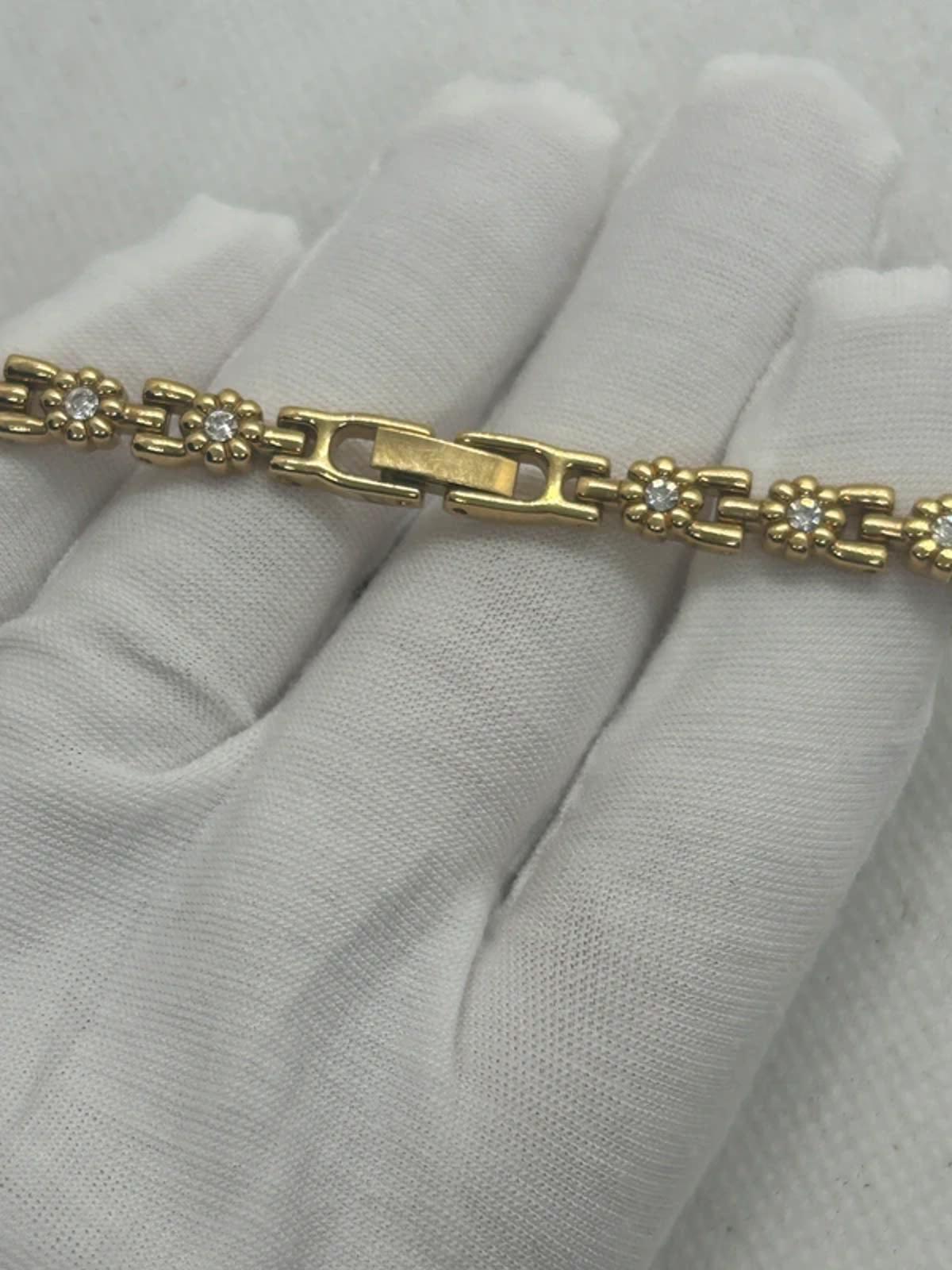 Ladies limit gold cocktail dress watch silver dial with box and papers