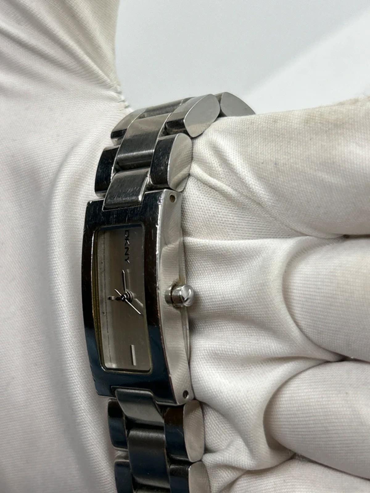 Ladies DKNY slim size silver watch with white dial and silver bracelet