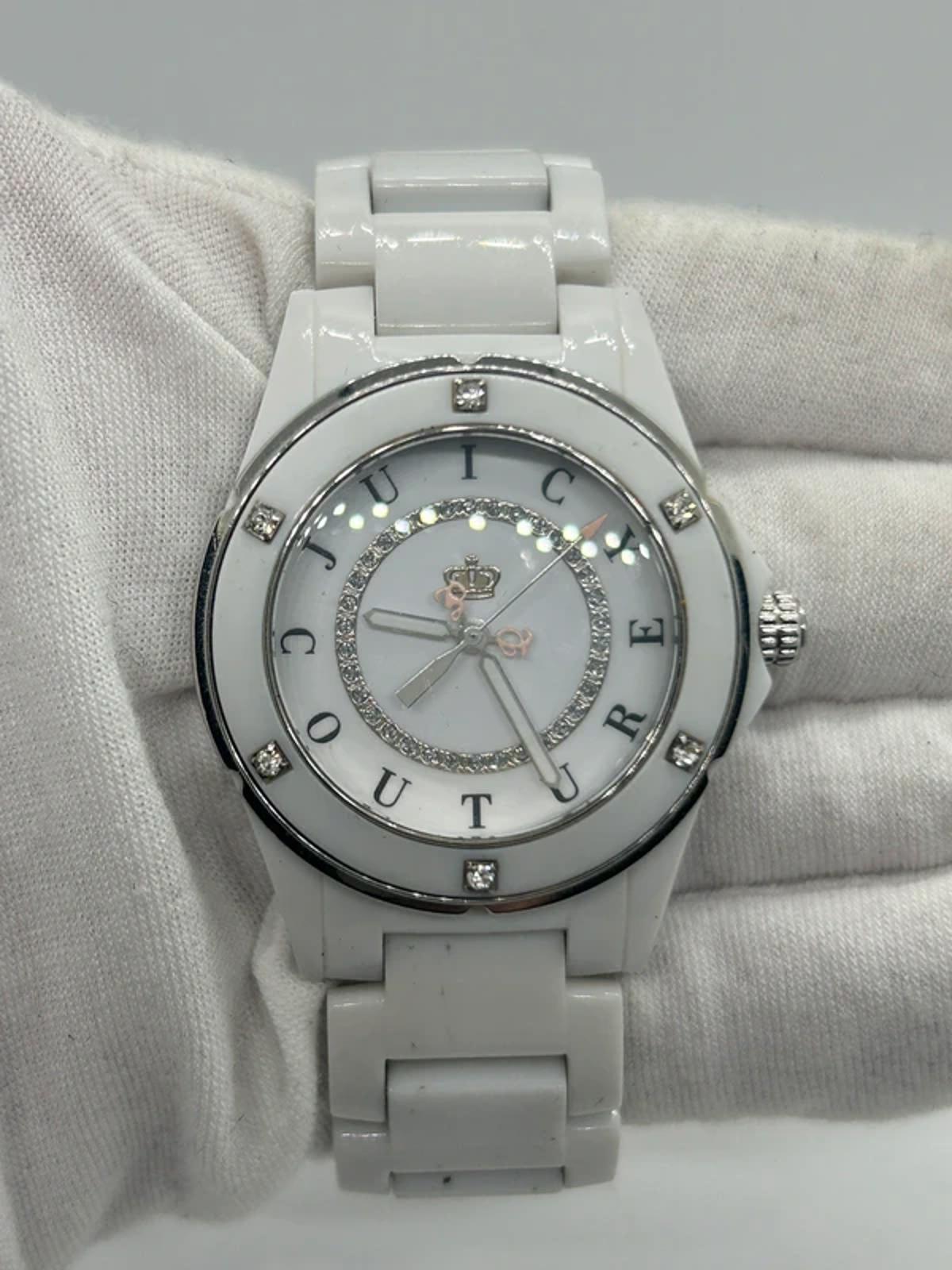 Ladies Juicy couture white plastic watch with diamantés