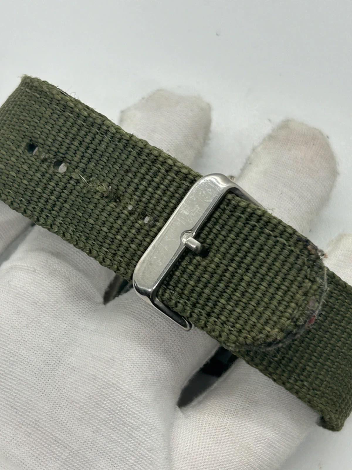 Zeiger sports watch with black case green dial and green fabric strap